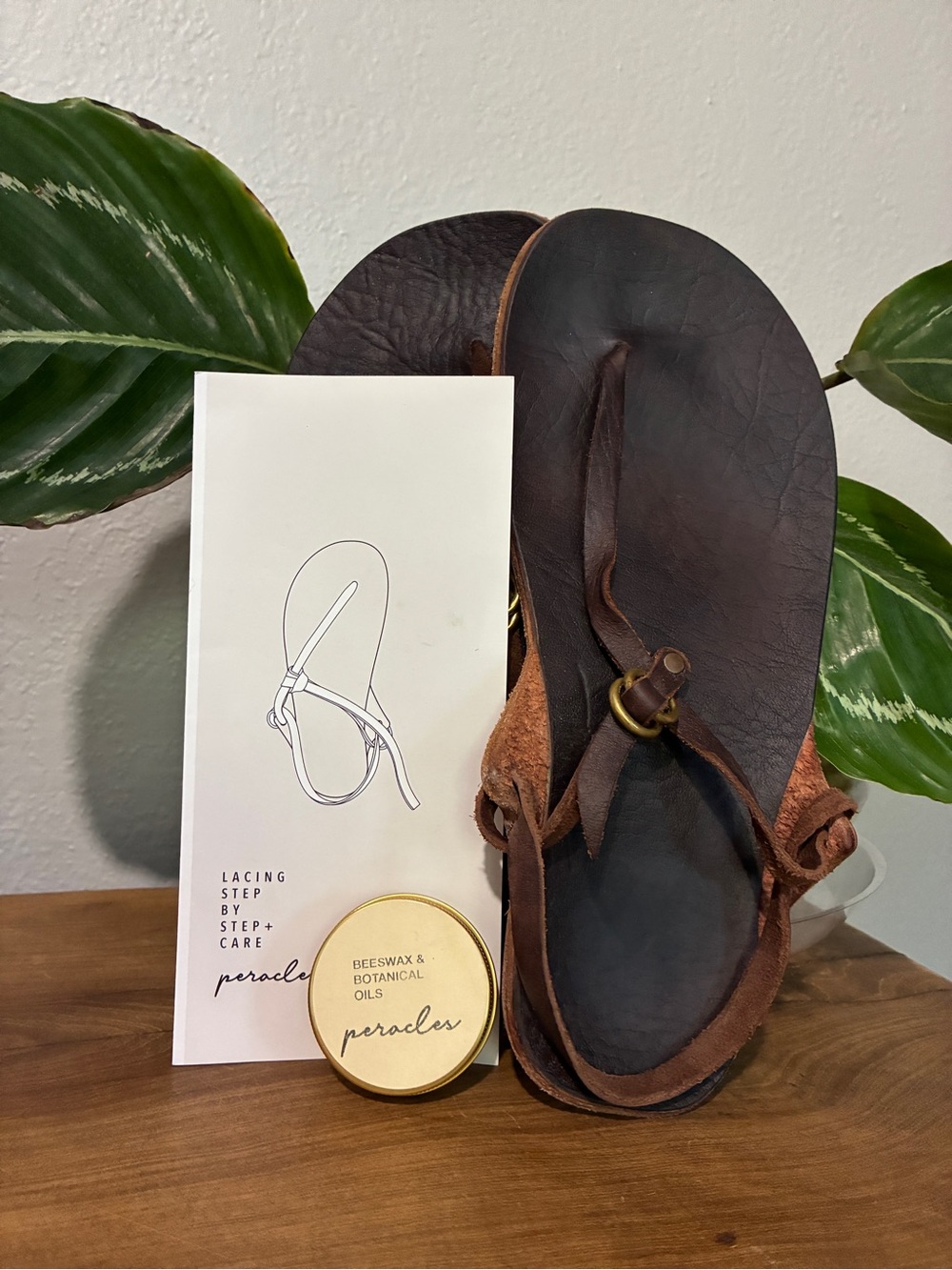 Women’s Brown Leather Thong Sandals with Buckle Accent